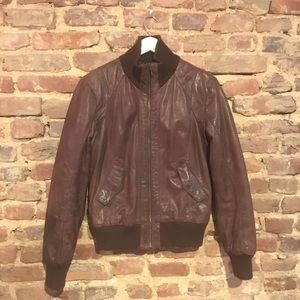 Brown leather bomber jacket with internal quilting